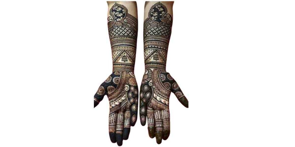Traditional Full-Hand Bridal Mehndi with Detailed Mandala and Net Patterns