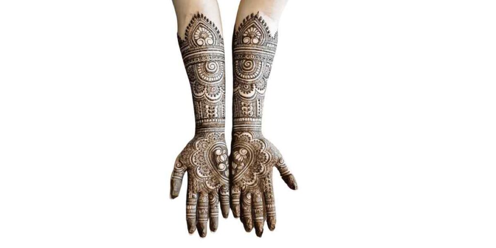 Intricate Full-Hand Bridal Mehndi with Heart Motifs and Traditional Swirls