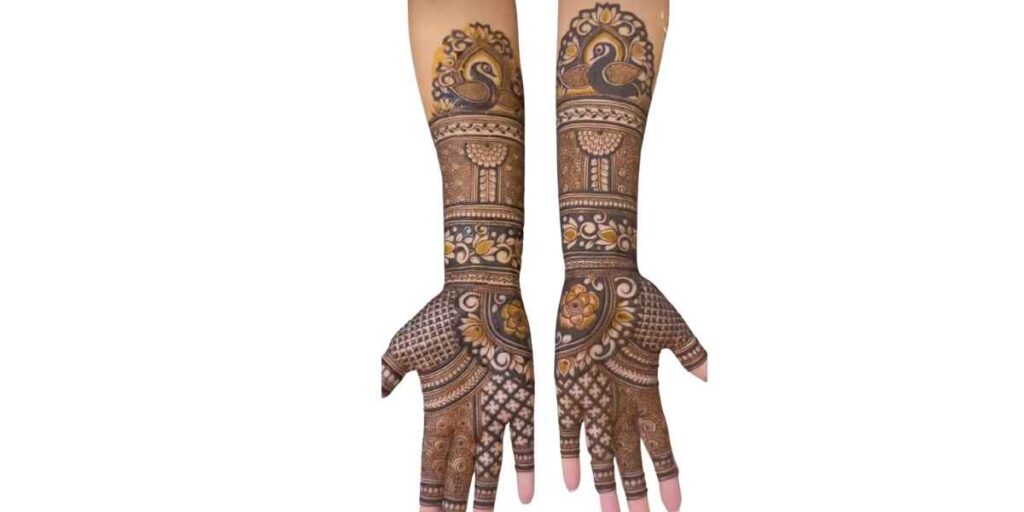 Royal Peacock-Themed Full-Hand Mehndi with Bold Shading and Symmetrical Panels

